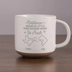 The Love Between Mother And Daughter Knows No Distance - Family Personalized Custom Pottery Mug - Gift For Mom, Daughter